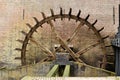 Cogwheel drive the watermill. Royalty Free Stock Photo