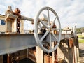 Cogwheel of old dam of vintage sewage channel