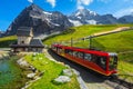 Cogwheel tourist train coming down from the mountain, Jungfraujoch, Switzerland Royalty Free Stock Photo