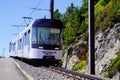 Cogwheel train in french volcano chain in auvergne with text Panoramique des Domes