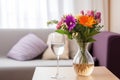 a cohabitation agreement next to a vase with fresh flowers