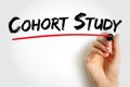 Cohort Study handwritten with a red underline drawn by a human hand. Symbolic representation of organized research, teamwork, data Royalty Free Stock Photo