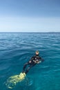 Young woman scuba-diving in Canales de Afuera island area Royalty Free Stock Photo