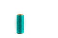 A coil of aqua thread. Spool of colored threads on a white background. Waxed sewing thread for leather crafts. Royalty Free Stock Photo