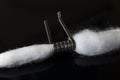 Coil and cotton for rda vaping with black background Royalty Free Stock Photo