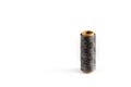 A coil of gray thread. Spool of colored threads on a white background. Waxed sewing thread for leather crafts. Royalty Free Stock Photo