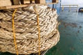 Coil of a hawser rope on board a construction work barge Royalty Free Stock Photo