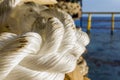 Coil of a hawser rope on board a construction work barge Royalty Free Stock Photo