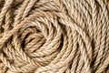 A coil of old rope close-up. Royalty Free Stock Photo