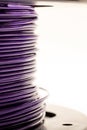 Coil with purple wires on a white background