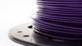 Coil with purple wires on a white background