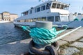 Coiled Blue Rope and Cleat at the pier Royalty Free Stock Photo