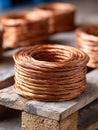 Coiled copper wire for industrial and construction purposes. Royalty Free Stock Photo