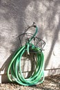 Coiled Green Garden Hose Royalty Free Stock Photo