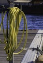 Coiled hosepipe on a jetty Royalty Free Stock Photo