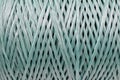 Coiled nylon rope texture background. Blue rolled  striped nylon rope pattern. A coil of new colored rope surface Royalty Free Stock Photo