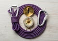 Coiled purple climbing rope encircles a Royalty Free Stock Photo