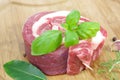 Coiled raw beef with basil Royalty Free Stock Photo