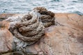 Coiled rope tied the knot on close-up Royalty Free Stock Photo