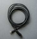 Coiled USB extension cable with connector ends.. Royalty Free Stock Photo