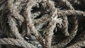 Coiled, weathered rope texture. Perfect for rustic, nautical, or vintage designs. Royalty Free Stock Photo
