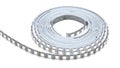 A coiled white LED strip light featuring small, square diodes at regular intervals. The strip is Royalty Free Stock Photo