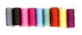 Coils of colored thread on a white background Royalty Free Stock Photo