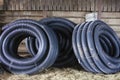 Coils of perforated land drainage pipe