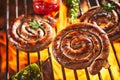 Coils of succulent spicy sausage grilling on fire