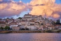 Coimbra city view at sunset with Mondego river and beautiful historic buildings, in Portugal Royalty Free Stock Photo