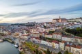 Coimbra drone aerial city view at sunset with Mondego river and beautiful historic buildings, in Portugal Royalty Free Stock Photo