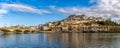 Panorama view of the old town of Coimbra in Portugal with river in the foreground Royalty Free Stock Photo