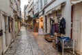 COIMBRA, PORTUGAL - OCTOBER 12, 2017: Narrow alley in the center of Coimbr Royalty Free Stock Photo