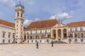 View of the tower building of the University of Coimbra, classic architectural structure with masonr and other classic buildings