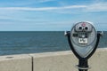 Coin binoculars close-up on the shore of the Atlantic Ocean