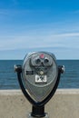 Coin binoculars close-up on the shore of the Atlantic Ocean