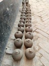 Coin box called Gullak drying in sunlight, Indian village life, clay business