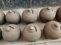 Coin box called Gullak drying in sunlight, Indian village life, clay business