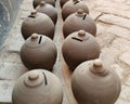 Coin box called Gullak drying in sunlight, Indian village life, clay business