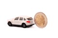 Coin and a car Royalty Free Stock Photo