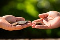 Coin collaboration hands in hand gesture, giving coins, finance concept