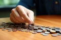 Coin collection Hands counting and sorting coins of different types