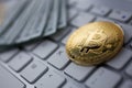 Coin crypto currency bitcoin lies on the keyboard Royalty Free Stock Photo