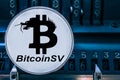Coin cryptocurrency Bitcoin SV and numbers of the arithmometer. BSV Royalty Free Stock Photo