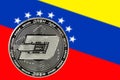 Coin Cryptocurrency Dash on the background of the flag of Venezuela.