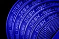 The coin cryptocurrency Dash closeup on blue black background. Royalty Free Stock Photo