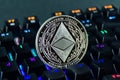 Coin cryptocurrency ethereum classic close-up of the colour-coded keyboard