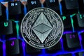 Coin cryptocurrency ethereum classic close-up of the colour-coded keyboard