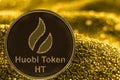 Coin cryptocurrency ht huobi token on golden background. Bitcoincash.