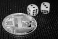 Coin cryptocurrency litecoin and rolling dice